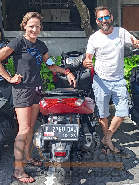 Safar Bali Rent Bike - Couple Clients 6 Couple enjoying Bali sightseeing on a scooter hired from Safar Bali Rent Bike.